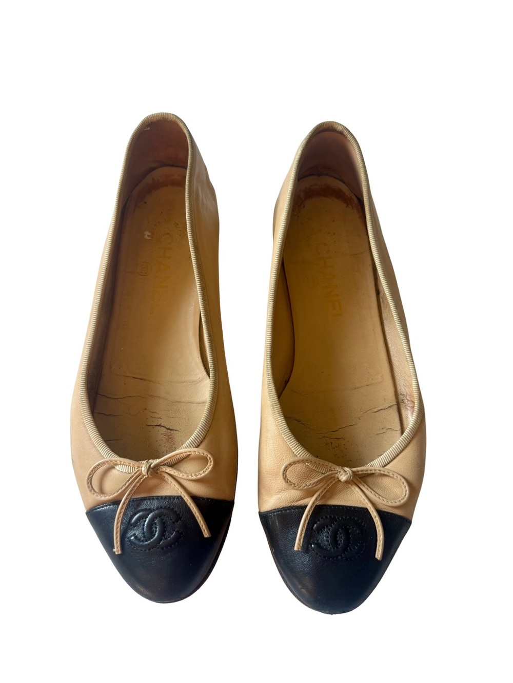 CHANEL Cambon Two-Tone Leather Ballet Flats in Beige and Black